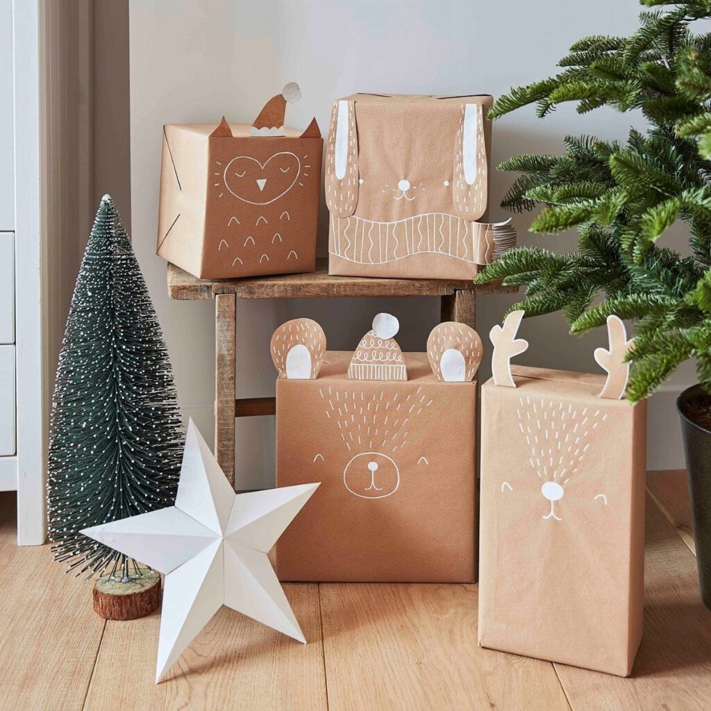 Animal-themed gifts wrapped in brown kraft paper with white hand-drawn faces and ears.